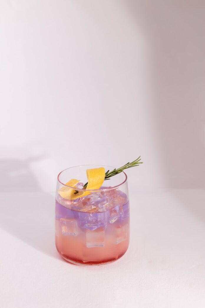 a glass with a drink in it