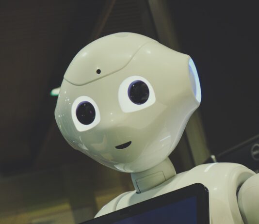 AI와 함께하는 일상 건강관리, 실천 가능한 새로운 변화 white robot toy holding black tablet